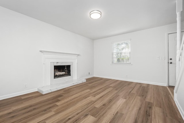 601 Boyd Mill Ave Unit O4, Franklin, TN 37064 - unfurnished living room with wood finished floors and a high end fireplace
