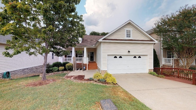 2044 Branch Oak Trl, Nashville, TN 37214 - view of front of home with covered porch, a front lawn, a garage, and driveway