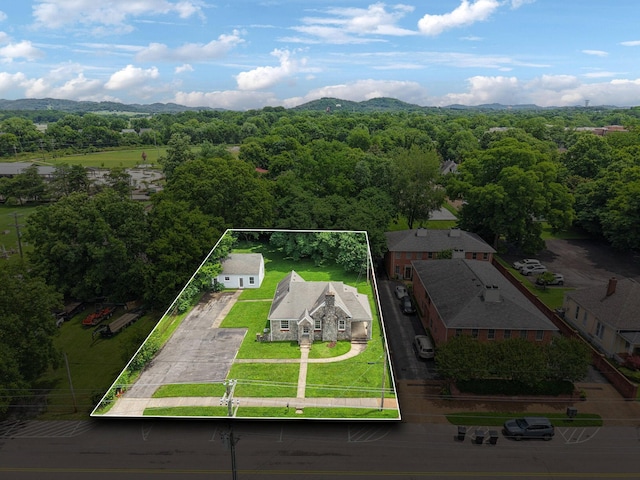 234 4th Ave N, Franklin, TN 37064 - aerial overview of property's location with property boundaries highlighted and a mountain backdrop