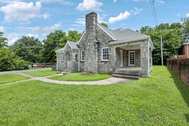 234 4th Ave N, Franklin, TN 37064 - view of front of property with stone siding, a chimney, and a shingled roof