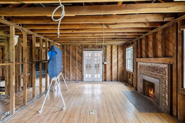 234 4th Ave N, Franklin, TN 37064 - miscellaneous room featuring a fireplace, wood-type flooring, and french doors