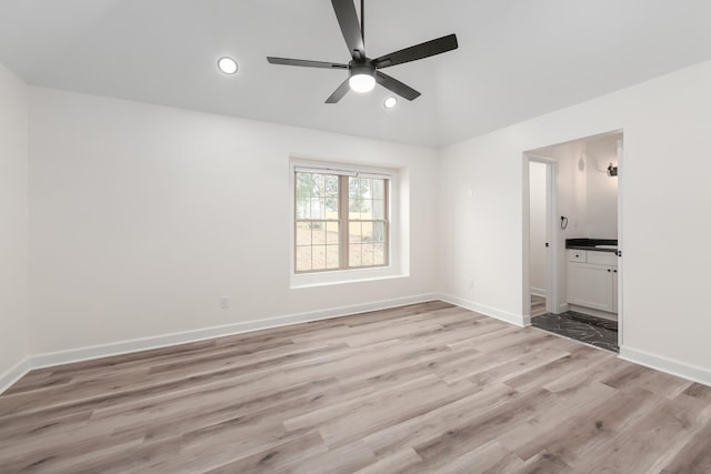 461 Summit Rd, Stanton, TN 38069 - unfurnished bedroom featuring light wood-type flooring, recessed lighting, vaulted ceiling, ensuite bathroom, and a ceiling fan