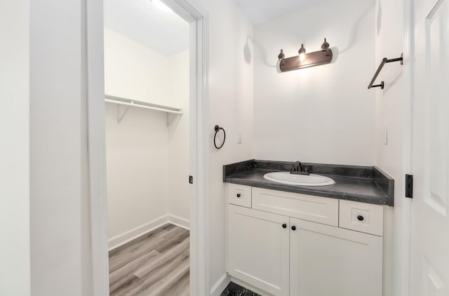 461 Summit Rd, Stanton, TN 38069 - bathroom featuring vanity and wood finished floors