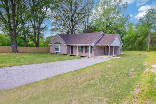 461 Summit Rd, Stanton, TN 38069 - ranch-style home featuring gravel driveway, brick siding, and roof with shingles