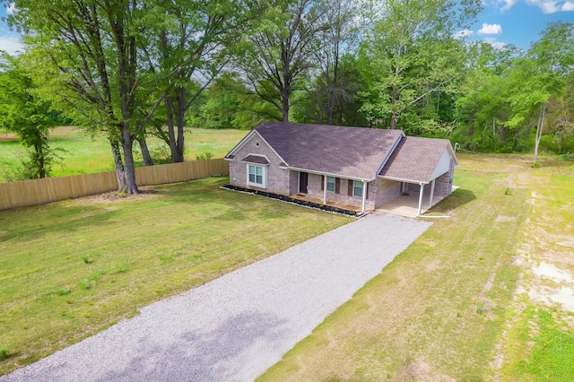 461 Summit Rd, Stanton, TN 38069 - ranch-style house featuring driveway, covered porch, brick siding, and a shingled roof