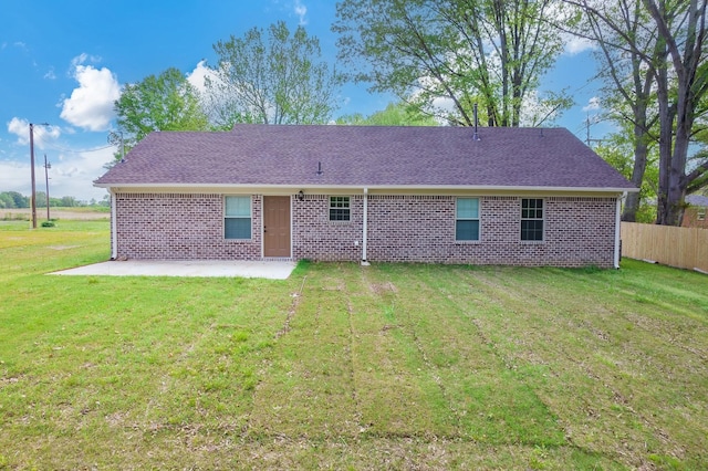 461 Summit Rd, Stanton, TN 38069 - rear view of property featuring a patio, brick siding, and a shingled roof