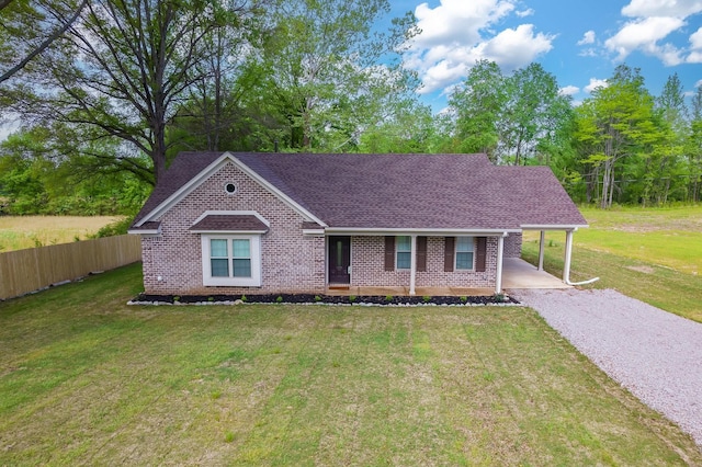 461 Summit Rd, Stanton, TN 38069 - view of front of home with driveway, brick siding, a carport, and roof with shingles