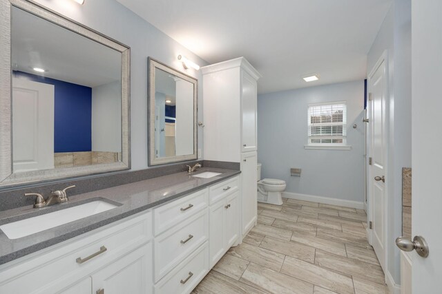 33 Maple Ln, Summertown, TN 38483 - full bathroom featuring double vanity and wood finish floors