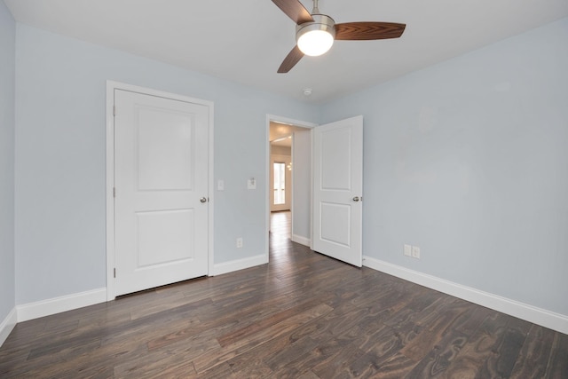 33 Maple Ln, Summertown, TN 38483 - unfurnished bedroom with dark wood-style flooring and a ceiling fan