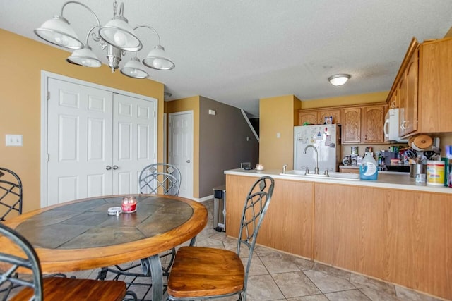 324 Chesire Way, Oak Grove, KY 42262 - dining area with light tile patterned floors and a textured ceiling