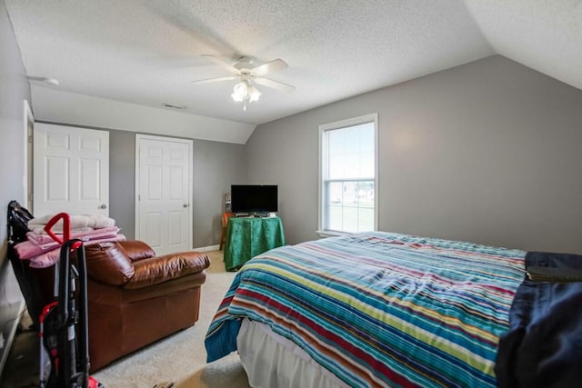 324 Chesire Way, Oak Grove, KY 42262 - carpeted bedroom featuring lofted ceiling, a ceiling fan, and a textured ceiling