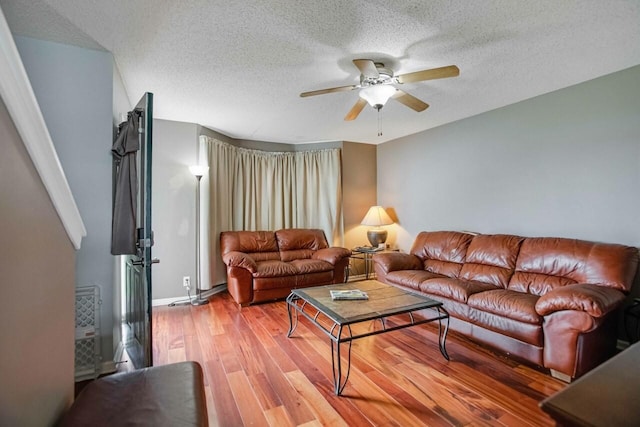 324 Chesire Way, Oak Grove, KY 42262 - living area featuring light wood-type flooring, a ceiling fan, and a textured ceiling