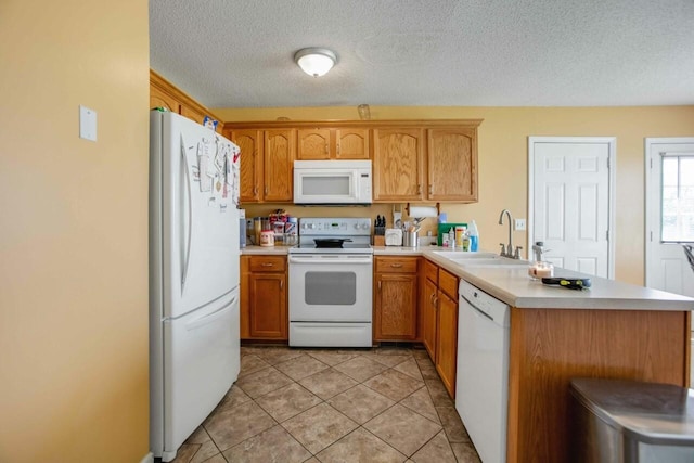 324 Chesire Way, Oak Grove, KY 42262 - kitchen with white appliances, a peninsula, light countertops, a textured ceiling, and light tile patterned floors