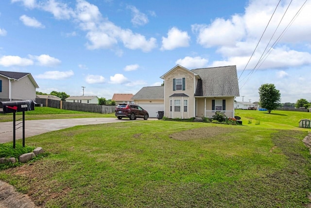324 Chesire Way, Oak Grove, KY 42262 - traditional-style house featuring driveway, a porch, a shingled roof, and an attached garage