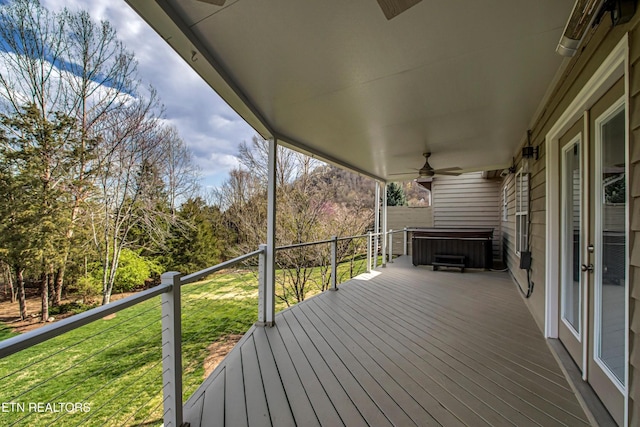 57 Riverview Dr, Oak Ridge, TN 37830 - wooden deck with a hot tub, a ceiling fan, and a yard