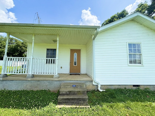 571 E Main St, Auburn, KY 42206 - doorway to property with a porch and crawl space