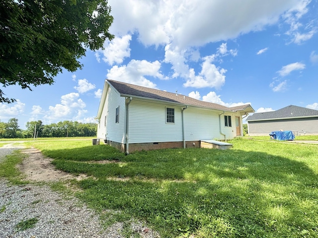 571 E Main St, Auburn, KY 42206 - back of house featuring a lawn and crawl space