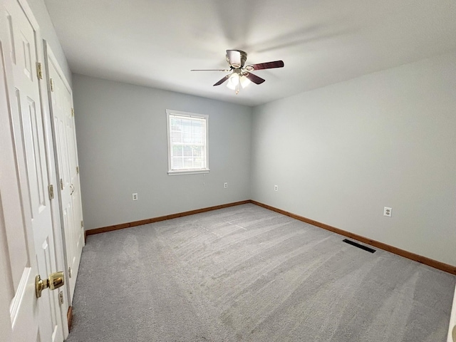 571 E Main St, Auburn, KY 42206 - unfurnished bedroom with light carpet and ceiling fan