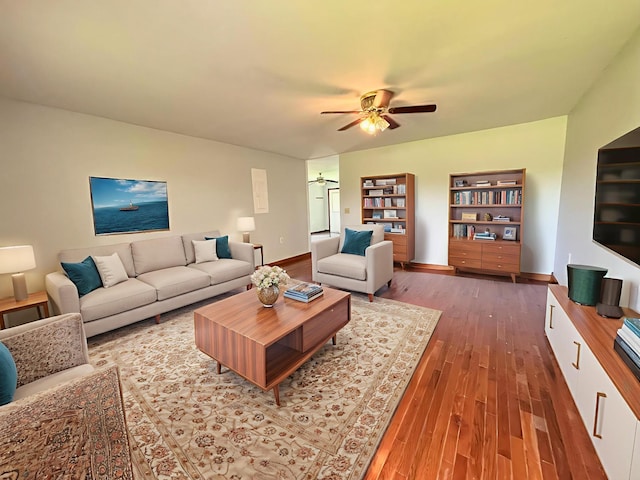 571 E Main St, Auburn, KY 42206 - living area with wood finished floors and a ceiling fan