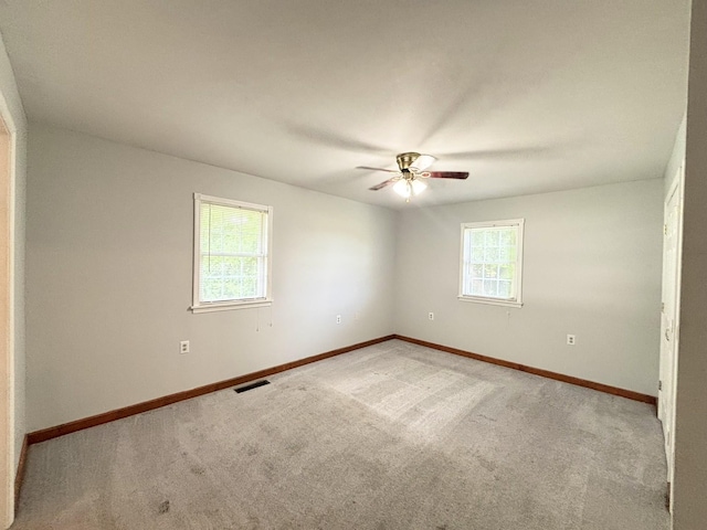 571 E Main St, Auburn, KY 42206 - empty room with a ceiling fan and light carpet