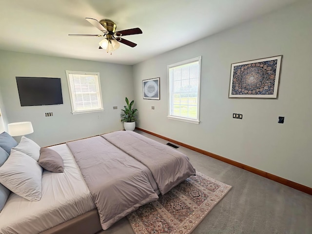 571 E Main St, Auburn, KY 42206 - carpeted bedroom with baseboards and a ceiling fan