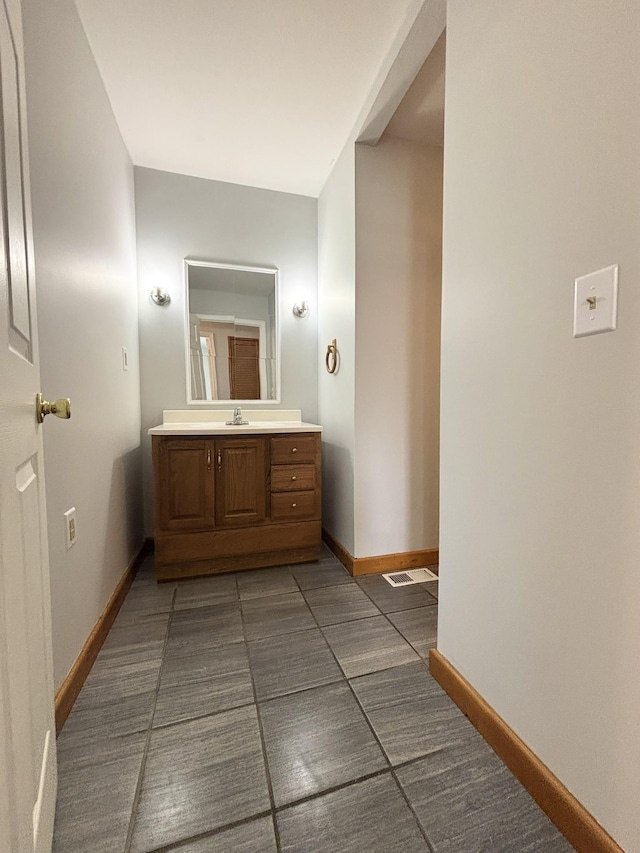 571 E Main St, Auburn, KY 42206 - bathroom with vanity and baseboards