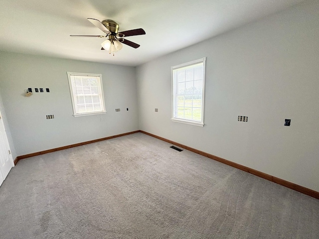 571 E Main St, Auburn, KY 42206 - empty room with ceiling fan and light carpet
