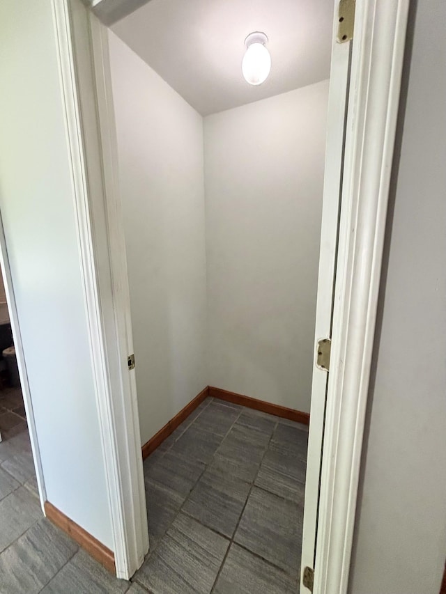 571 E Main St, Auburn, KY 42206 - tiled empty room featuring baseboards