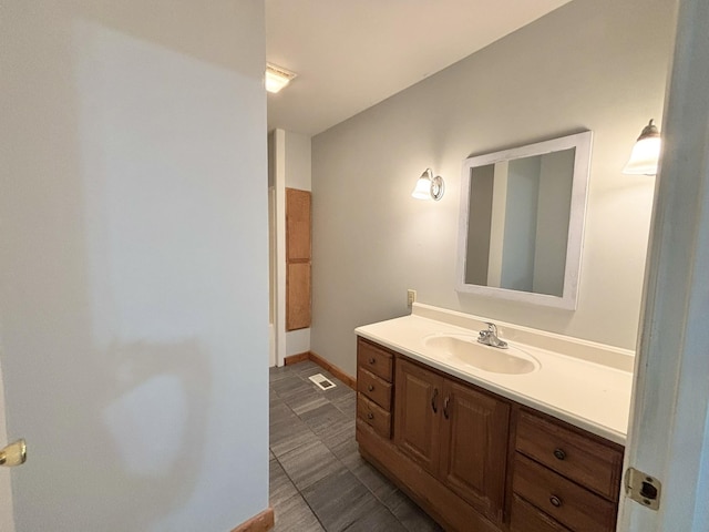 571 E Main St, Auburn, KY 42206 - bathroom featuring vanity and baseboards