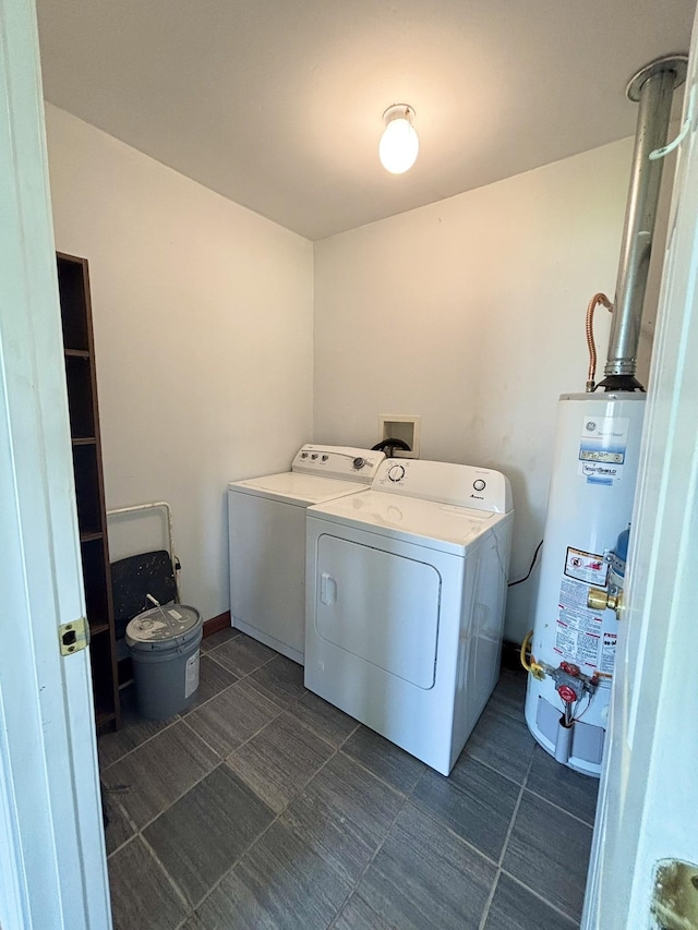 571 E Main St, Auburn, KY 42206 - laundry area with gas water heater and separate washer and dryer