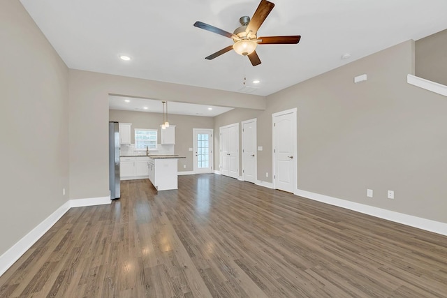 127 Dry Creek Commons Dr, Goodlettsville, TN 37072 - unfurnished living room with a ceiling fan, wood finished floors, and recessed lighting