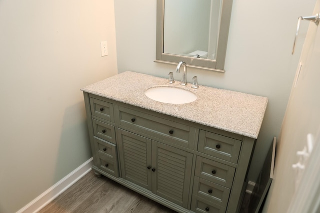 31 Community Rd, Lawrenceburg, TN 38464 - bathroom with vanity and wood finished floors
