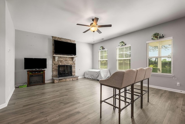 3210 Chatfield Dr, Murfreesboro, TN 37129 - dining area with a fireplace, ceiling fan, and wood finished floors