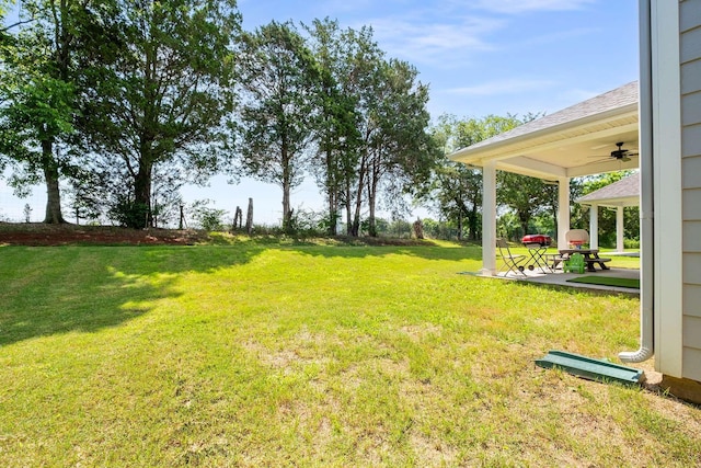 3210 Chatfield Dr, Murfreesboro, TN 37129 - view of green lawn featuring a ceiling fan