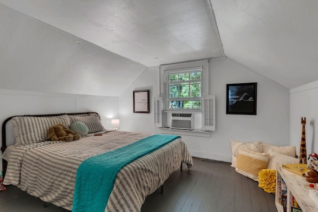 203 6th Ave, Columbia, TN 38401 - bedroom with vaulted ceiling, cooling unit, and wood-type flooring