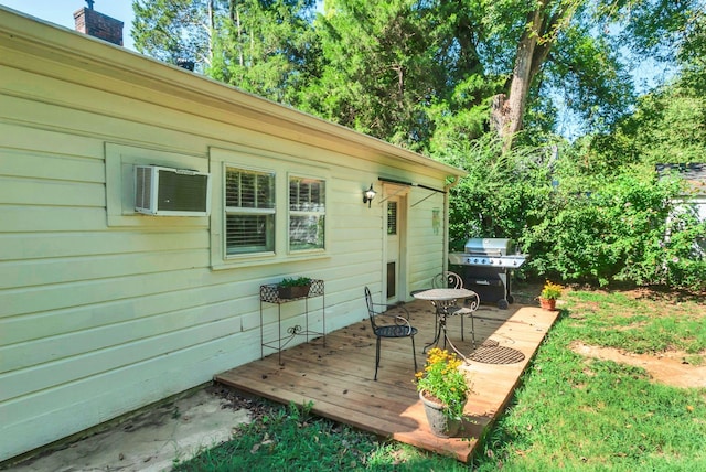 203 6th Ave, Columbia, TN 38401 - wooden terrace with grilling area and a wall mounted air conditioner