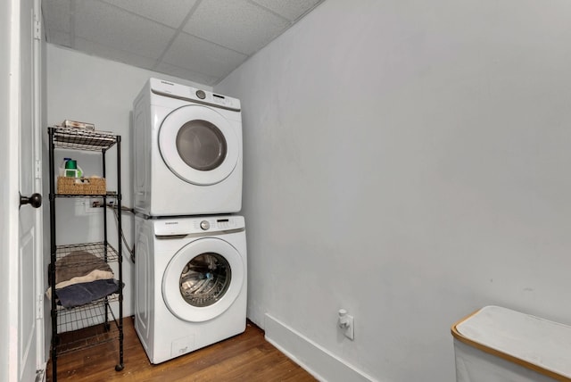 203 6th Ave, Columbia, TN 38401 - washroom with stacked washer / dryer and wood finished floors