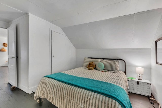 203 6th Ave, Columbia, TN 38401 - bedroom featuring hardwood / wood-style flooring and vaulted ceiling