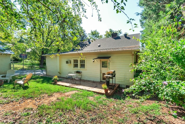 203 6th Ave, Columbia, TN 38401 - rear view of property with a deck and roof with shingles