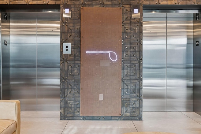 1014 16th Ave S Unit 103, Nashville, TN 37212 - kitchen with elevator and tile patterned flooring