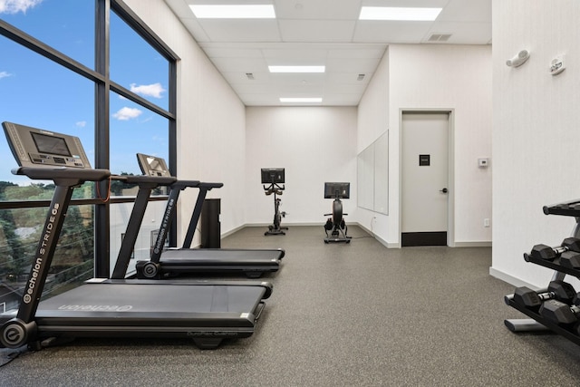 1014 16th Ave S Unit 103, Nashville, TN 37212 - exercise room featuring a paneled ceiling and a towering ceiling