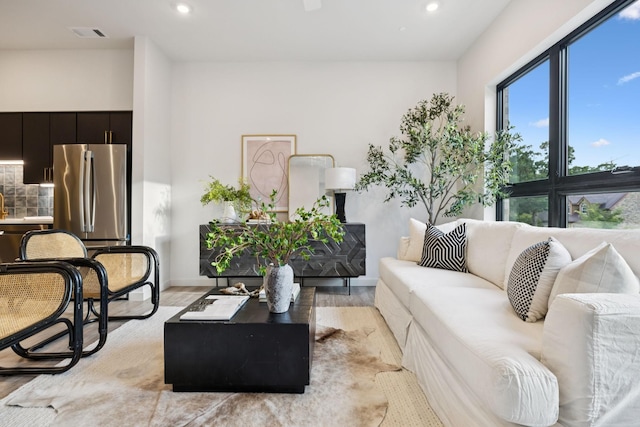 1014 16th Ave S Unit 103, Nashville, TN 37212 - living area featuring recessed lighting and light wood-type flooring