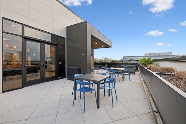 1014 16th Ave S Unit 103, Nashville, TN 37212 - view of patio featuring outdoor dining area