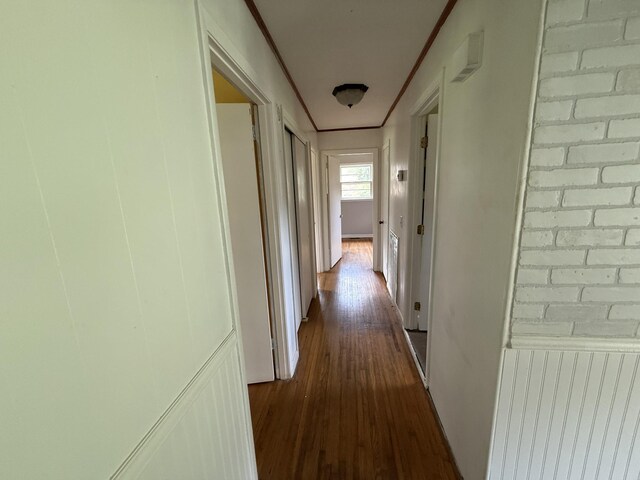 125 Benco Ln, Camden, TN 38320 - hallway with dark wood finished floors and ornamental molding