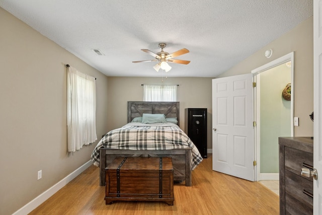 5 Old Chisholm Creek Rd, Lawrenceburg, TN 38464 - bedroom featuring light wood finished floors, ceiling fan, and a textured ceiling