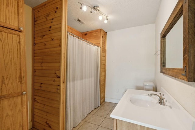 5 Old Chisholm Creek Rd, Lawrenceburg, TN 38464 - bathroom featuring tile patterned floors, vanity, a shower with curtain, and a textured ceiling