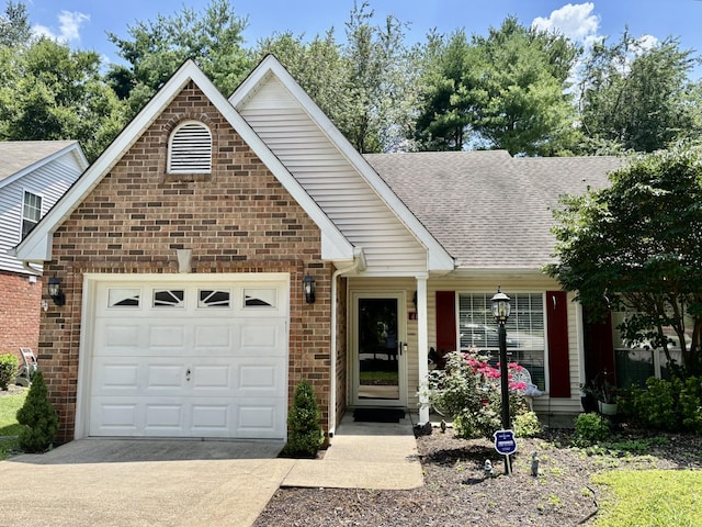 610 Messick Ct, Murfreesboro, TN 37130 - view of front of house with concrete driveway, roof with shingles, a garage, and brick siding