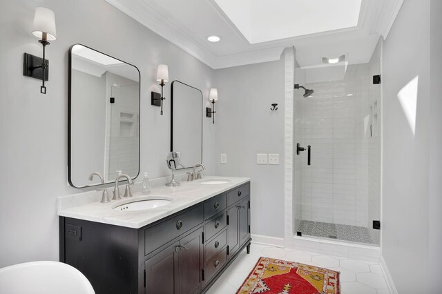 904 Oxford Ct, Brentwood, TN 37027 - bathroom featuring a shower stall, double vanity, tile patterned floors, crown molding, and recessed lighting