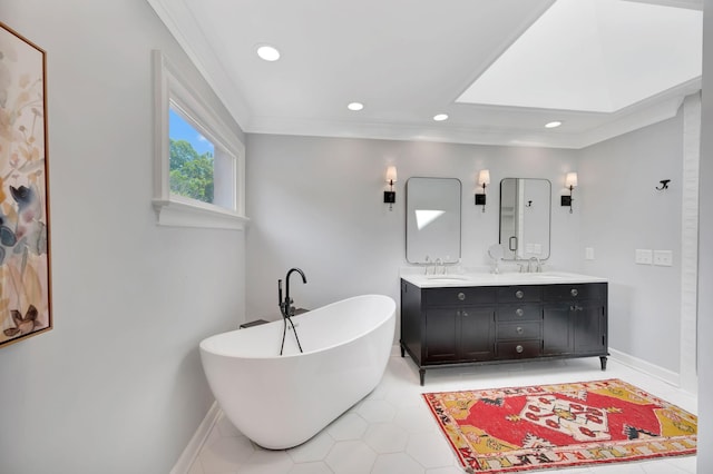 904 Oxford Ct, Brentwood, TN 37027 - full bathroom featuring double vanity, a freestanding bath, recessed lighting, ornamental molding, and tile patterned flooring