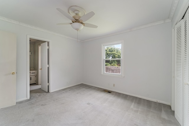 2208 Bowman Rd, Franklin, TN 37064 - unfurnished bedroom with ornamental molding, light colored carpet, a closet, ensuite bathroom, and ceiling fan